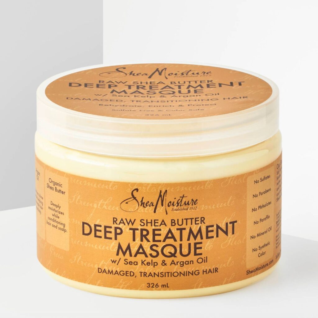 Tub of Shea Moisture deep conditioner in front of a grey and white background