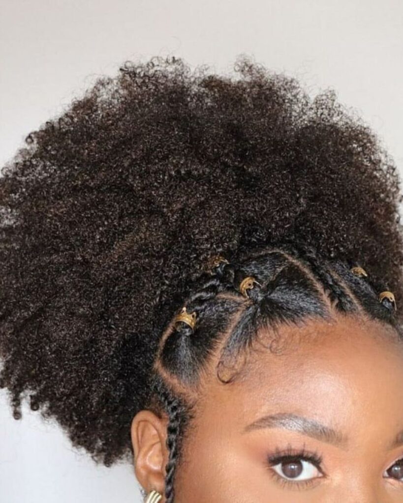 Picture of the rubberband afro puff hairstyle