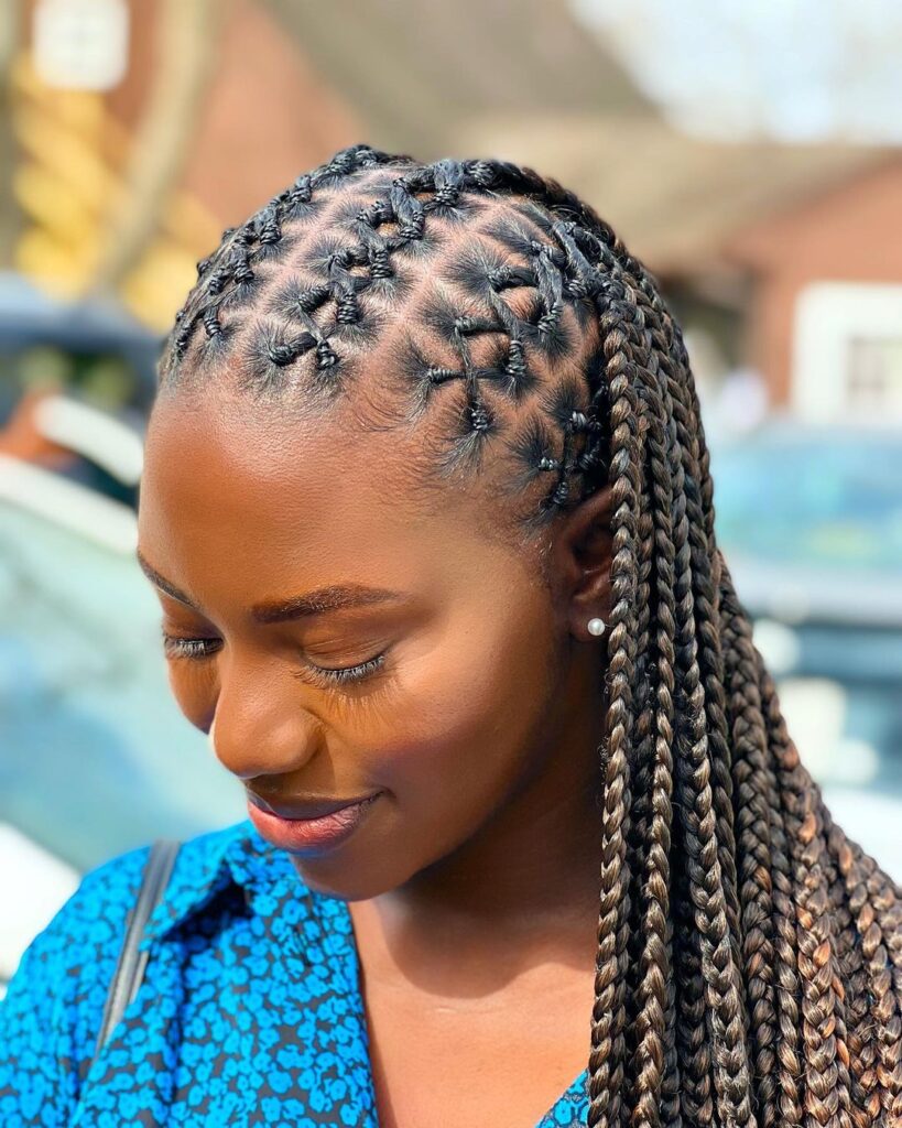 young woman showing off her criss cross box braids