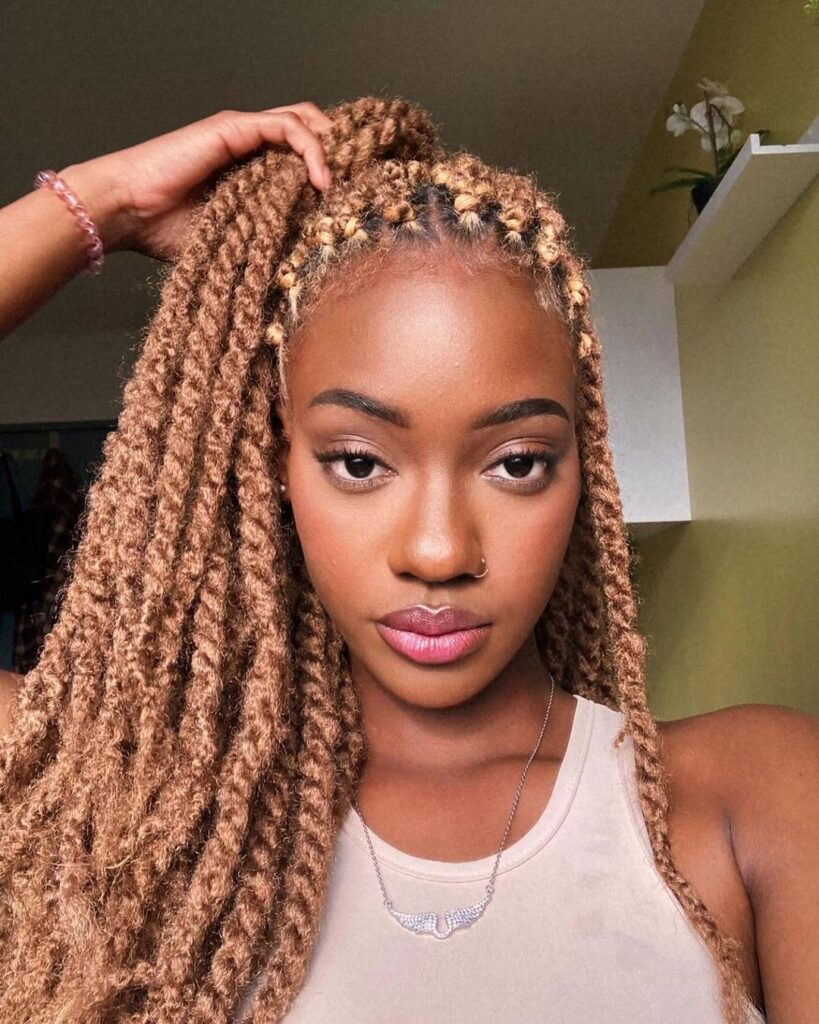 young black woman with distressed passion twists