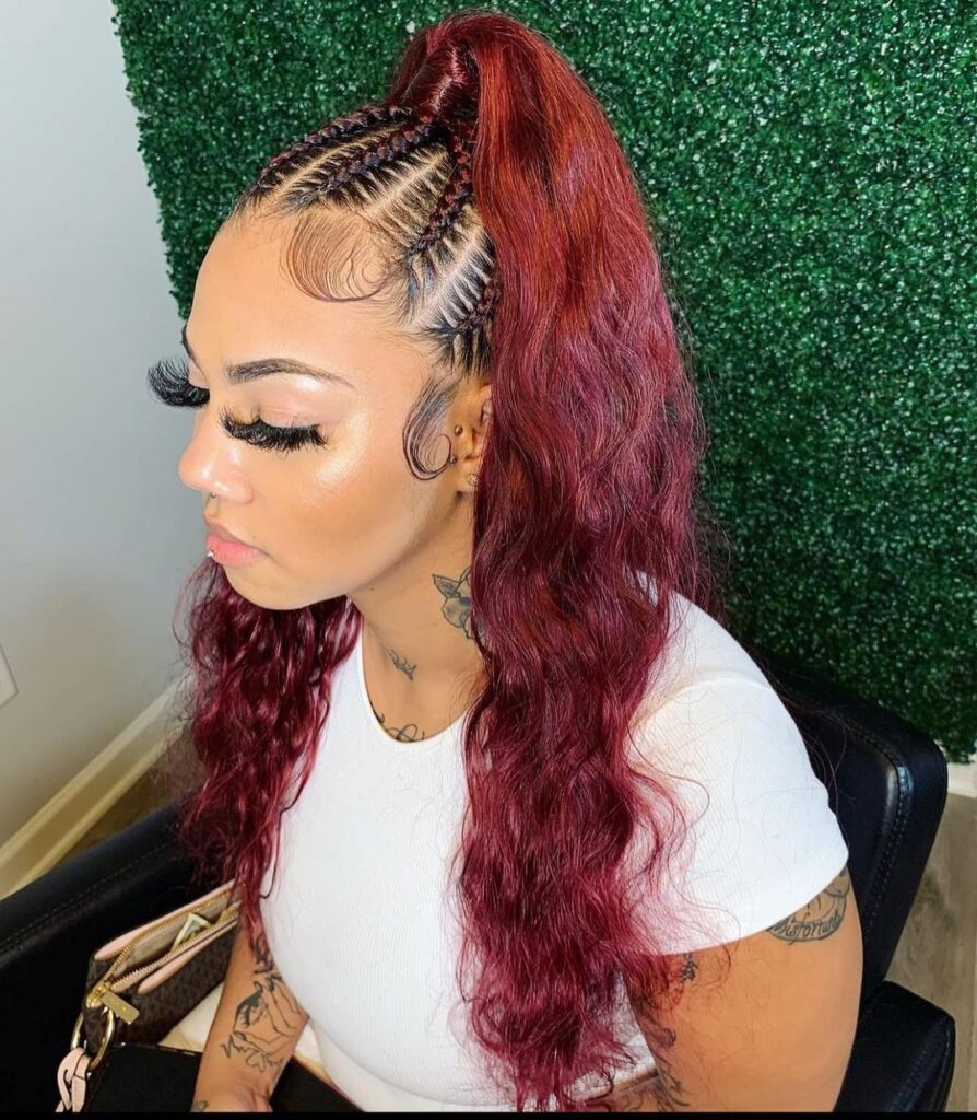 young black woman in salon with stitch braids ponytail