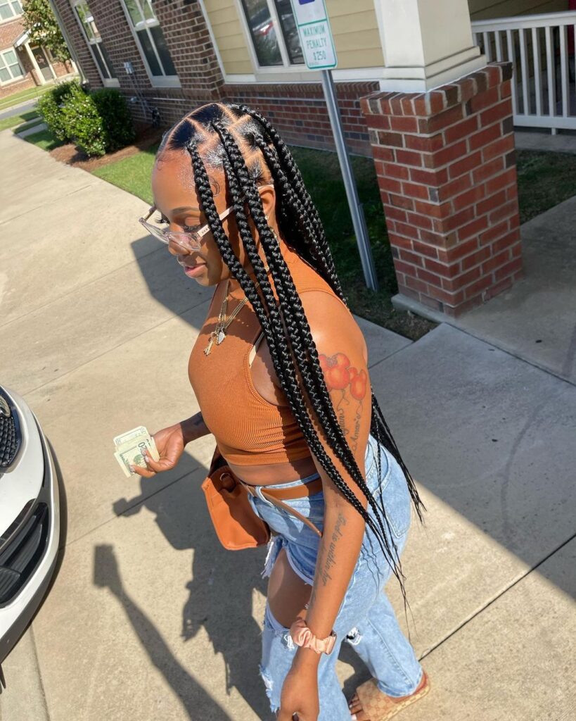 young black woman with thick box braids